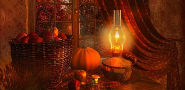 Cozy Fall Desktop Wallpaper featuring a glowing oil lamp, a basket of red apples, and a pumpkin by a window looking out to autumn trees