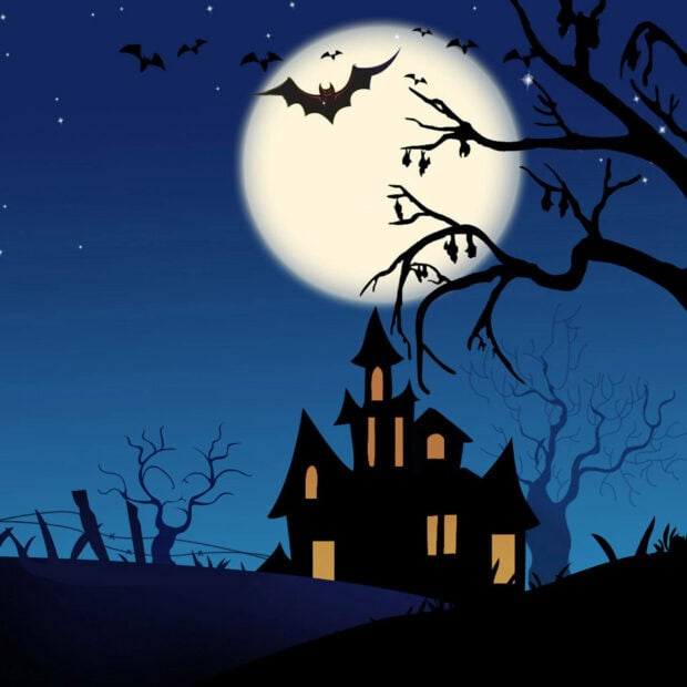 A spooky Halloween iPad wallpaper showcasing a silhouetted haunted house and bats flying under a large full moon