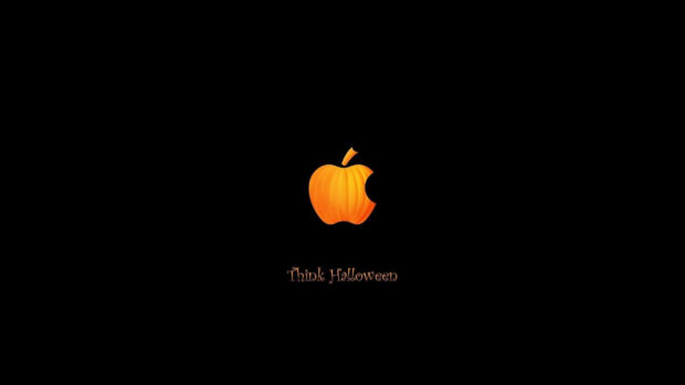 A minimalist Halloween Macbook wallpaper featuring an orange pumpkin-styled Apple logo on a solid black background with "Think Halloween" text