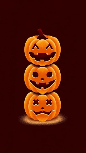 A minimalist Halloween Pumpkin Wallpaper featuring a stack of three cartoonish jack-o'-lanterns with various expressions on a dark background