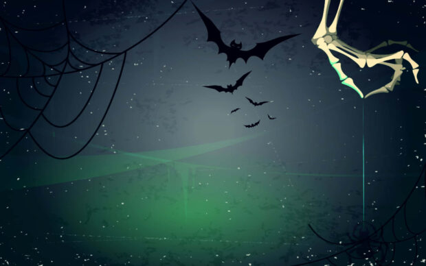 An abstract Halloween Skeleton Wallpaper featuring flying bats, spiderwebs, and a skeleton hand forming a heart shape on a green-blue gradient background