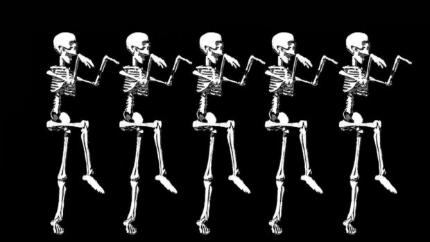 A lively Halloween Skeleton Wallpaper depicting five identical dancing skeletons in a line on a solid black background