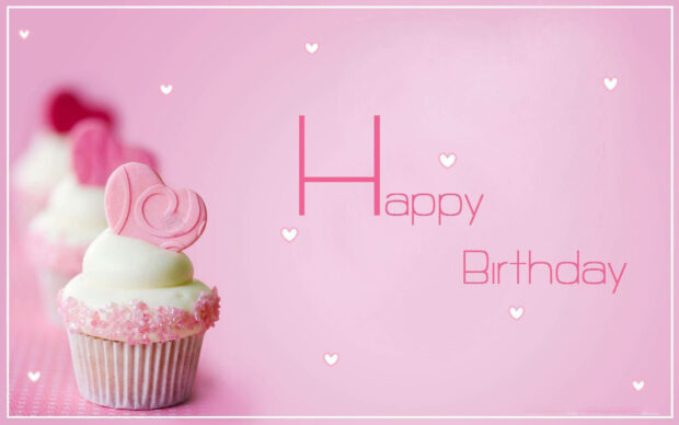 A charming pink Birthday Wallpaper featuring cupcakes with heart toppers and Happy Birthday text