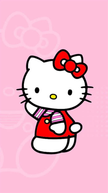 A classic Hello Kitty Fall Wallpaper showing Hello Kitty wearing a red coat and striped scarf against a light pink background with subtle bow patterns