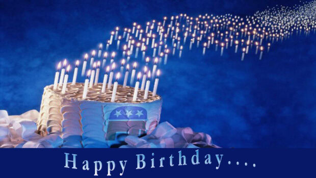Its My Birthday Wallpaper featuring a birthday cake with many lit candles and a stream of more candles receding into a blue background, with 'Happy Birthday' text
