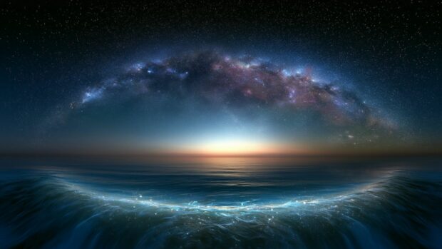 A stunning ocean wallpaper featuring the Milky Way galaxy arching over a tranquil sea with glowing waves at night
