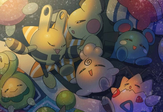 A charming Pokemon Halloween wallpaper featuring cute baby Pokemon like Elekid and Togepi in a soft, festive setting with glowing lights