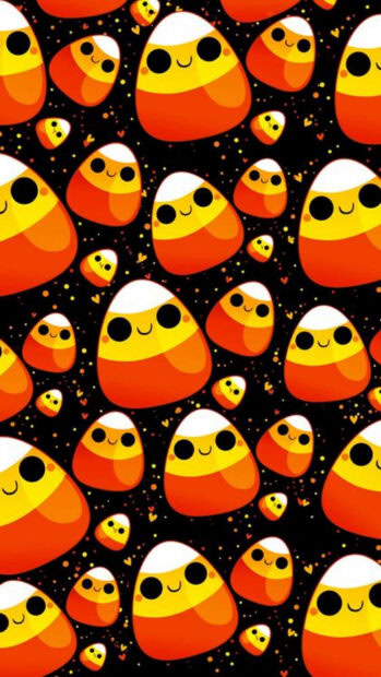 A preppy Halloween wallpaper showcasing a cute pattern of smiling candy corn pieces on a black background