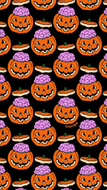 A preppy Halloween wallpaper featuring a fun pattern of jack-o-lanterns with pink brains on a black background