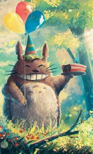An enchanting illustration of Totoro wearing a party hat and holding a cake with balloons, perfect as a Birthday Wallpaper