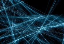 Abstract Lines Wallpaper Blue featuring a complex network of glowing blue lines on a dark background