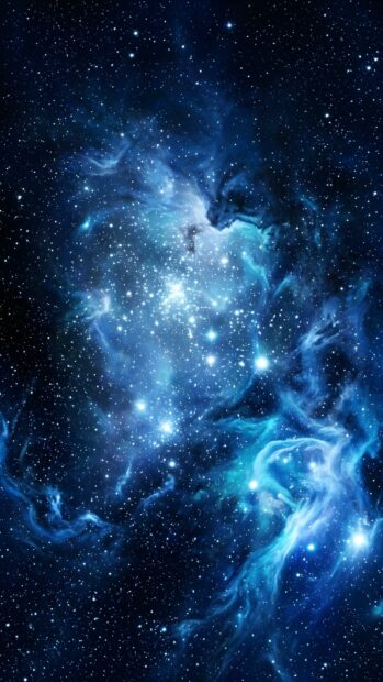 A stunning abstract space wallpaper blue featuring a bright nebula and numerous sparkling stars in a deep cosmic scene