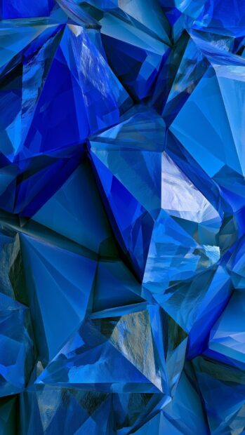 A vibrant blue aesthetic wallpaper showcasing an abstract pattern of shattered crystals or ice shards with sharp edges