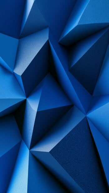 A blue aesthetic wallpaper displaying an abstract geometric low-poly pattern with sharp angles and varying blue hues