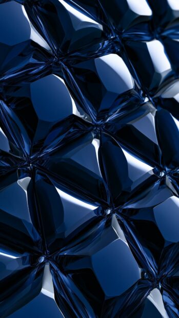 Blue aesthetic wallpaper displaying a glossy abstract pattern of dark blue geometric shapes with bright reflections