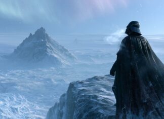 Darth Vader wallpaper standing on a snowy mountain ledge overlooking an icy landscape with an aurora borealis in the sky