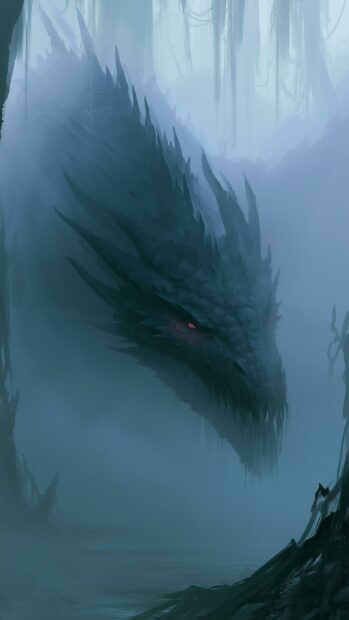 Dark dragon wallpaper with glowing red eyes emerging from a mystical misty forest