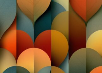 Fall aesthetic wallpaper featuring a vibrant abstract geometric pattern of overlapping, rounded leaf shapes in various autumn colors
