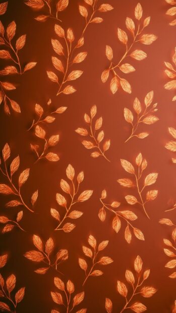 Fall Aesthetic Wallpaper showcasing a glowing pattern of autumn leaves and branches on a warm reddish background