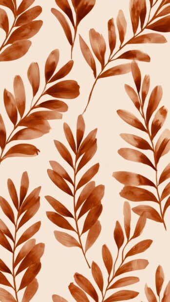 Fall aesthetic wallpaper displaying a repeating pattern of broad watercolor leaves in warm brown and orange tones