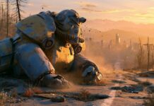 An iconic Fallout wallpaper featuring rusty Power Armor lying in a vast wasteland with a ruined city skyline at sunset