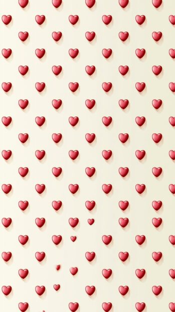 A lovely hearts wallpaper showcasing various sized glossy red hearts with subtle shadows scattered across a light beige background