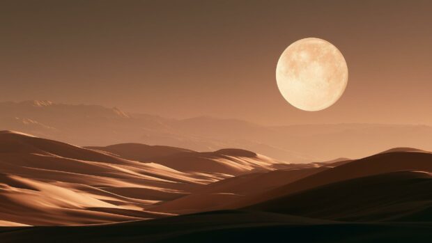 A stunning moon wallpaper featuring a large full moon over vast desert sand dunes with a warm, monochromatic palette