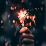 New Year Aesthetic Sparkler Hand Confetti Wallpaper