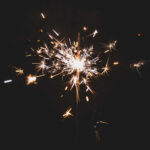New Year Aesthetic Sparkler Hand Dark Wallpaper