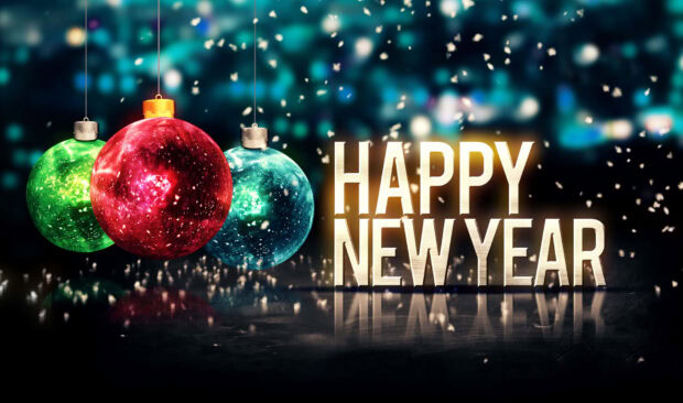 A vibrant New Year Aesthetic Wallpaper featuring three hanging ornaments and "HAPPY NEW YEAR" text with festive bokeh lights