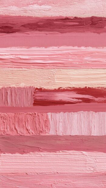 A beautiful pink aesthetic wallpaper featuring horizontal bands of various pink paint strokes with visible texture