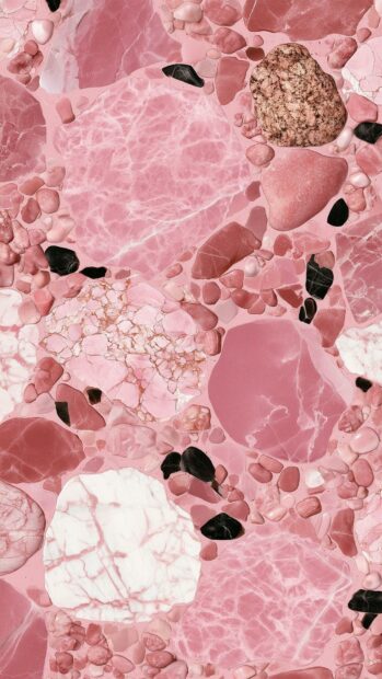 A stylish pink aesthetic wallpaper featuring a unique terrazzo and marble pattern with various pink, white, and black stones