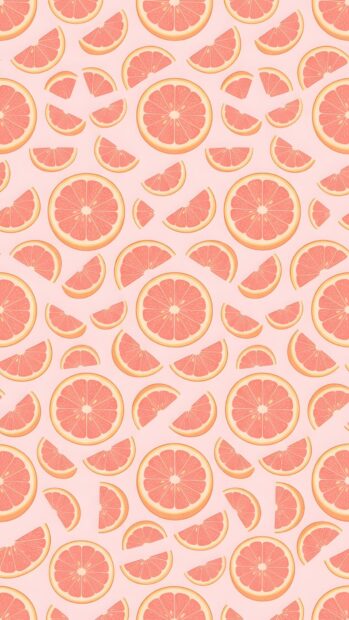 A delightful preppy wallpaper aesthetic featuring a seamless pattern of pink grapefruit slices on a light pink background