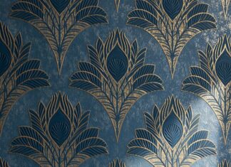 An elegant retro wallpaper featuring a repeated Art Deco pattern of golden peacock feathers on a textured blue background