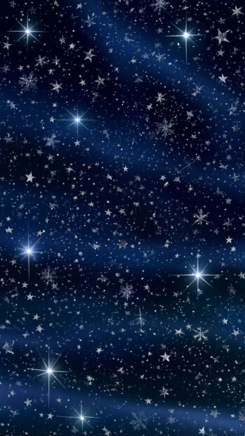 A serene Stars Wallpaper depicting a dark blue night sky filled with tiny stars and sparkling snowflake-like elements