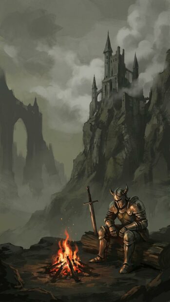 A knight rests by a bonfire beneath a distant castle in this atmospheric Dark Souls wallpaper