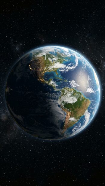 Earth viewed from space with North America in sight, showing illuminated city lights