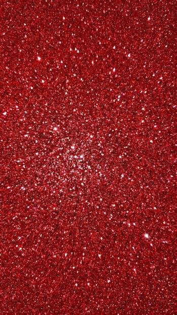 Red glitter texture creating a sparkling red aesthetic wallpaper