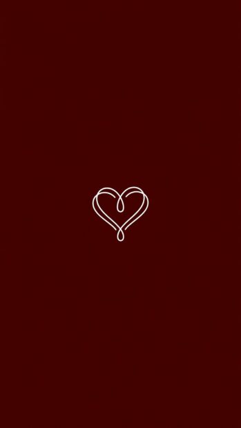 Minimalistic red aesthetic wallpaper with a white heart symbol on a deep red background