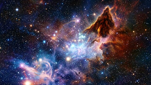 A cosmic landscape with a nebula and a mountainous formation in the foreground