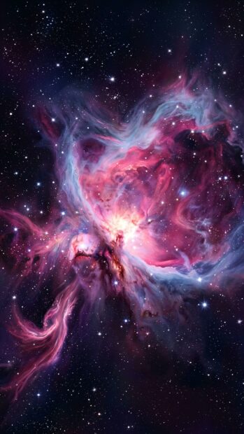 Vibrant pink and blue nebula clouds against a starry sky in a starfield nebula wallpaper