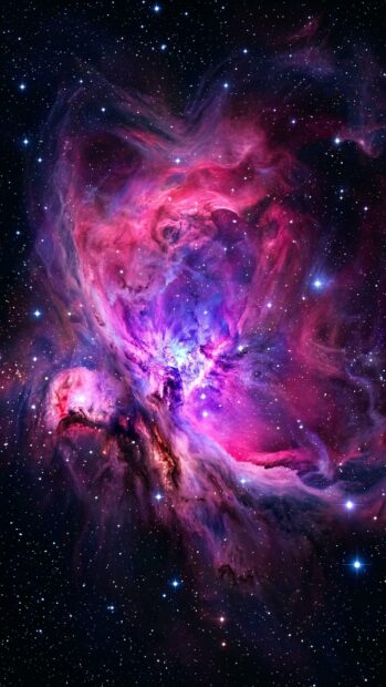 A stunning swirling pink nebula in a starfield setting
