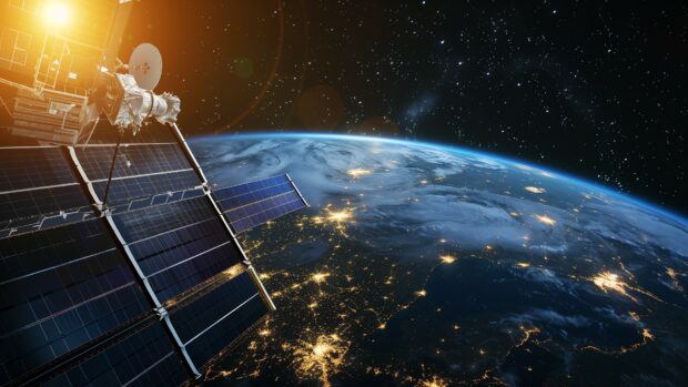 A high resolution image of the International Space Station orbiting Earth, with solar panels extended and Earth in the background Desktop wallpaper HD.