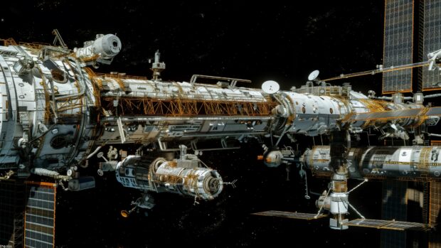 A panoramic view of the International Space Station with all its modules and solar arrays fully extended, floating in orbit wallpaper HD.