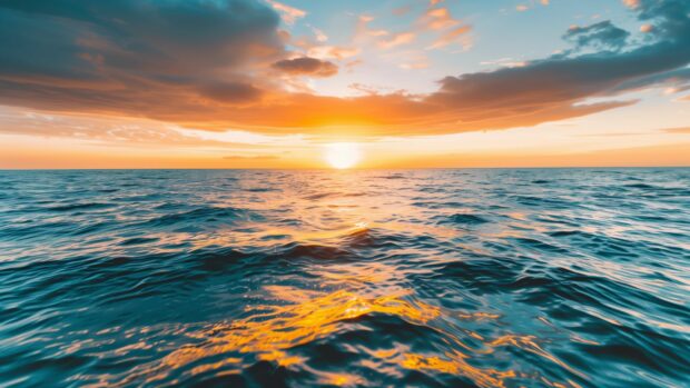 A peaceful view with Free Download Ocean Sunset Desktop Wallpaper.