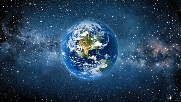 A serene image of Earth from space desktop wallpaper with the full planet in view, surrounded by a starry sky and the vastness of the universe.