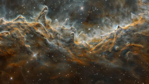 A vivid nebula wallpaper with swirling gases and bright stars, 4K space background.