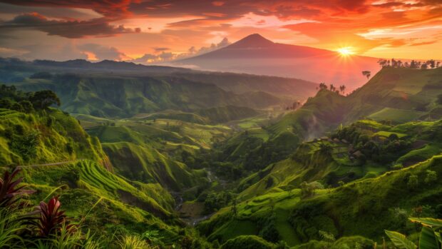 Aesthetic Nature Wallpaper with Majestic mountain range at sunrise, vibrant colors, lush green valleys, serene atmosphere.