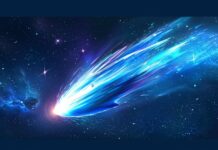 Blue Space Desktop Background with a close up view of a blue comet streaking across space, with its glowing tail illuminating the surrounding stars.