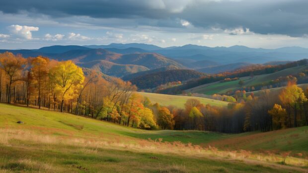 Fall wallpaper features a scenic mountain landscape in fall, high quality photography.